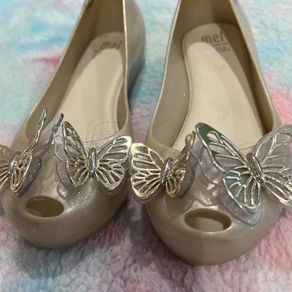 Gently used girls Mel by Melissa dress shoes. Size 12. Silver with butterflies. - Picture 3 of 3